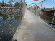 Smith Canal walking bridge with chain link fence surround - Date of 03.11.2020 shows at the bottom of the photo