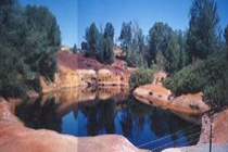 Flooded mine pit before reclamation (6 million gallons of acidic water)