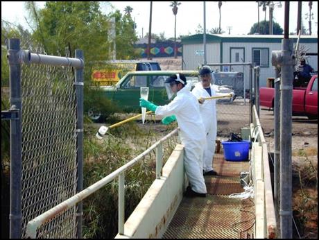 Regional Water Board staff sampling New River in Calexico