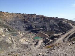 Photo of the Lehigh Permanente Quarry active mining site and quarry pit