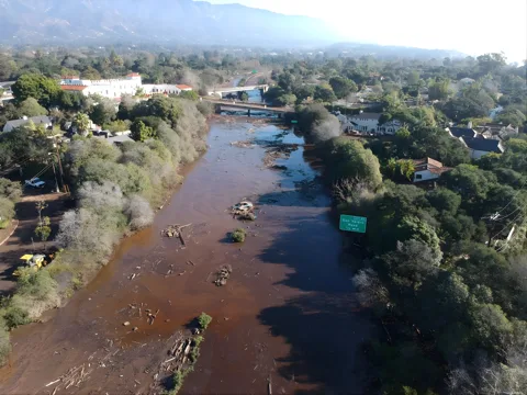 Aerial view of Highway 101 in Montecito covered in debris from a wildfire erosion debris flow