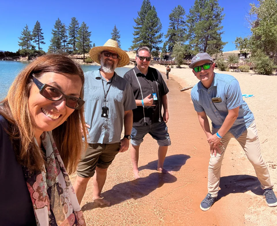 Group photo of Water Boards staff on a Lake Tahoe beach