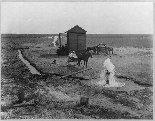 Artesian well with horse-drawn cart, Kern County, circa 1880