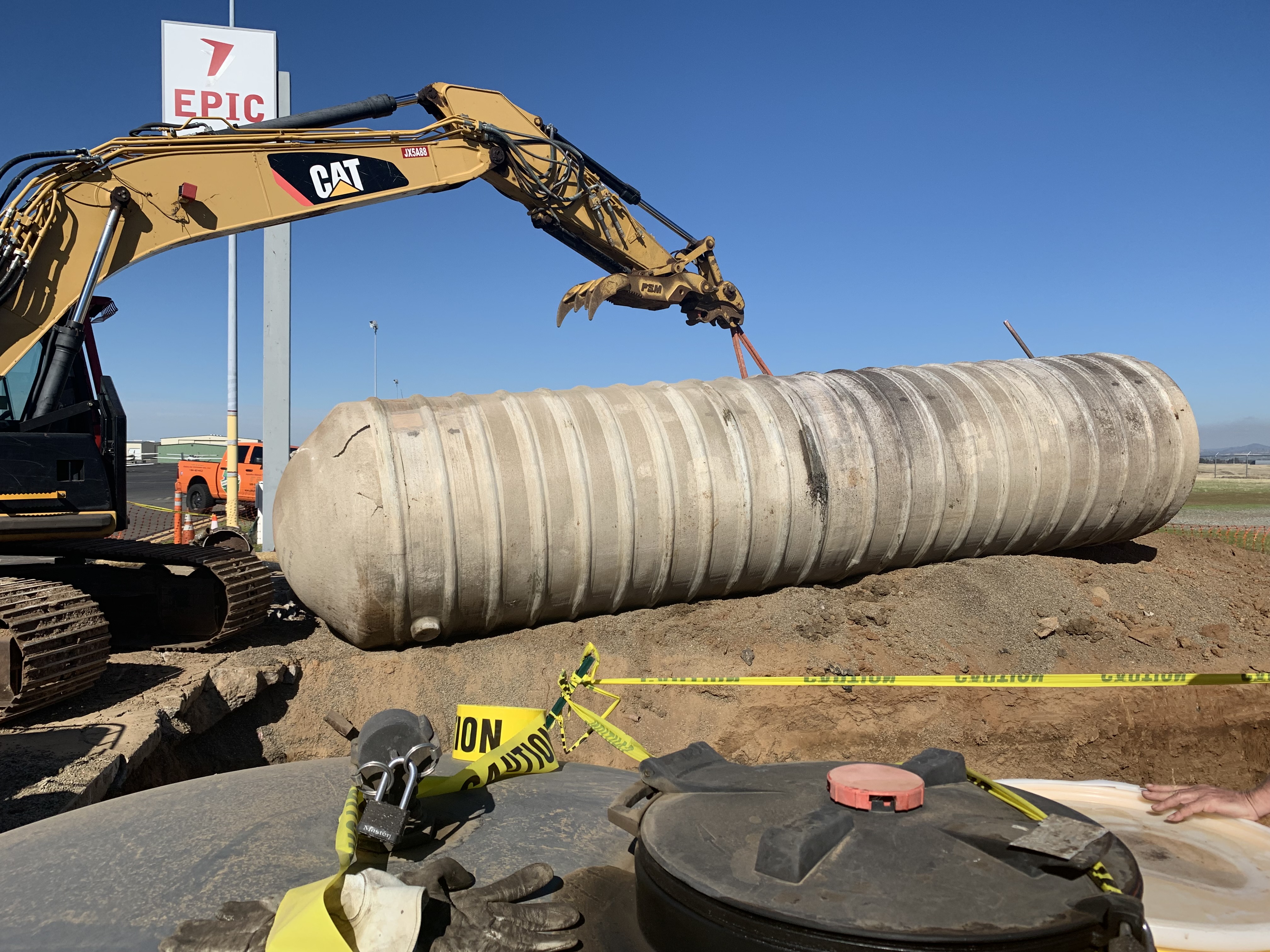 Removal of single-walled fiberglass UST using heavy machinery
